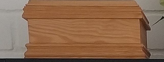Large plain wooden pet casket with natural finish