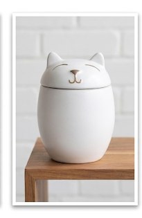 White cat-shaped pet memorial urn